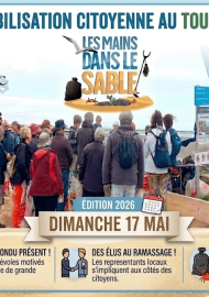 Les mains dans le sable